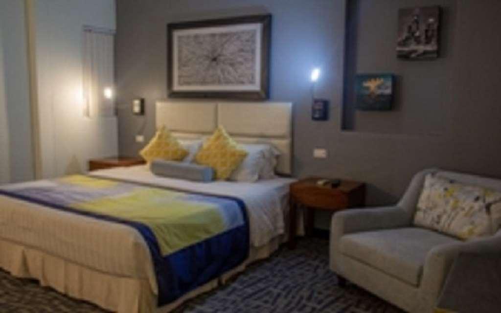 Century Hotel Garapan Habitación foto
