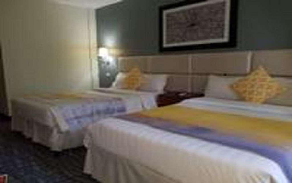 Century Hotel Garapan Habitación foto